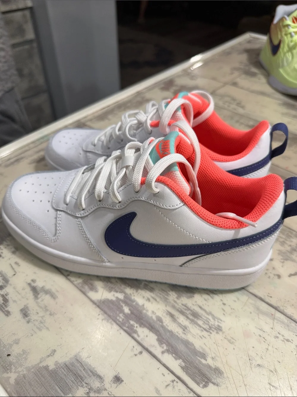 Nike White Low-Top Sneakers with Navy Swoosh & Coral-Pink Lining